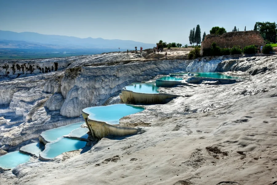 Guided daily tour to the white travertine terraces of Pamukkale and Hierapolis ancient city